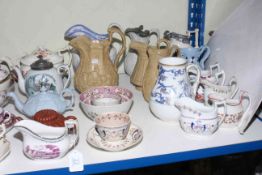 Collection of 19th Century and later pottery including relief moulded and other jugs, teapots,