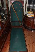 Vintage folding bar billiards table and accessories.