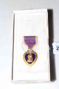 WWII Purple Heart medal, and marine good conduct medal (2).