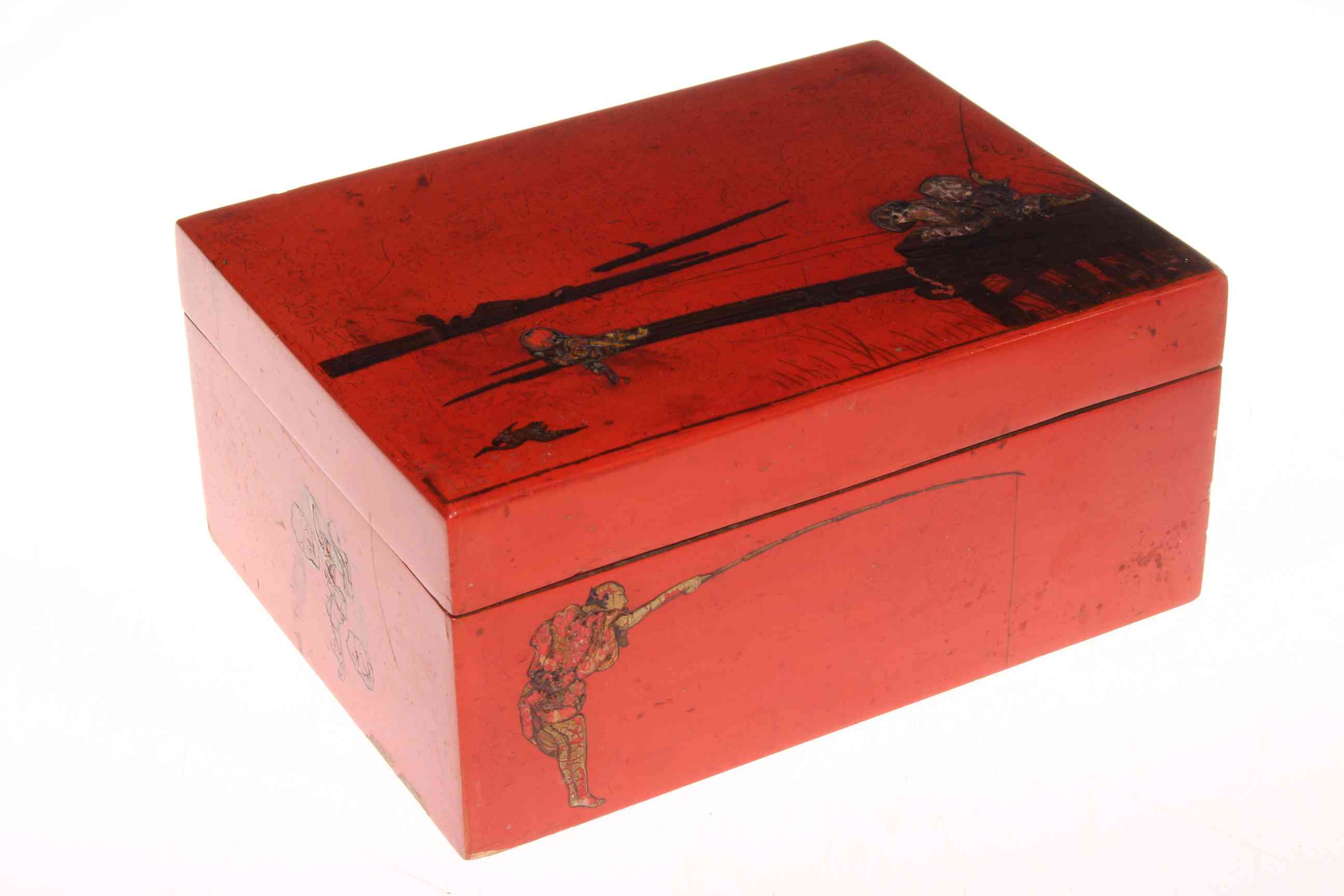 Mah-Jong pieces in Chinese lacquered box, 24cm across.