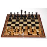 A Staunton boxwood and ebony chess set with mahogany box,