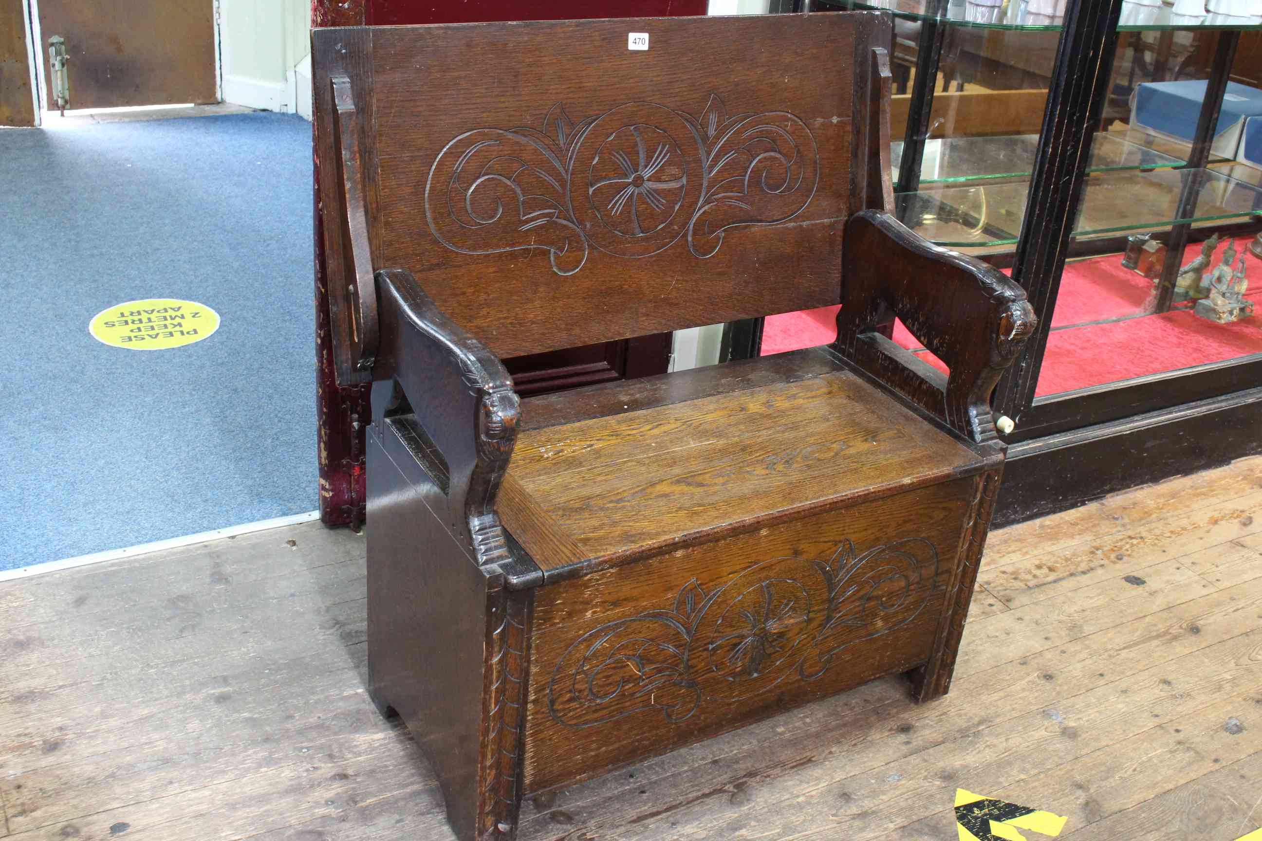 Carved oak monks bench, 73cm high by 92cm wide by 46cm deep (closed). - Image 2 of 2