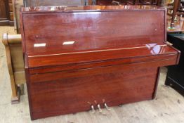 R. Schirmer lacquered rosewood upright overstrung piano, No.