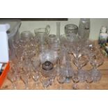 Assorted glassware including wine and champagne glasses, vases, jug, preserve jars, scent bottles,