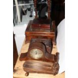 Pair of wooden candlesticks, three wood boxes, oak mantel clock and wooden football rattle.