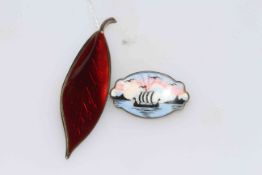 Two David Anderson silver and enamel brooches, ship brooch, and rich red leaf by Willy Winnaess,