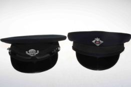 Four Police helmets and caps including Humber, WPC Patrol Cleveland,