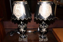 Pair of small as new metal table lamps with shades decorated with classical scenes and swags,