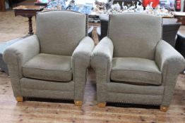 Pair Barker & Stonehouse Paul Robert easy chairs in brass studded fabric. (Tears to fabric).