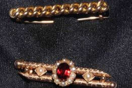 Early 20th Century garnet and seed pearl brooch together with chain link bar brooch (2).