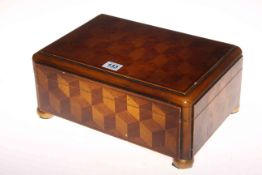 Mahogany box inlaid with a cube design of burr and satinwood,