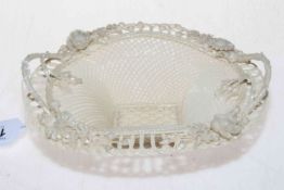 Belleek lst period oval basket, impressed mark, 26cm across. Condition: Minor 1.5cm damage to rim.