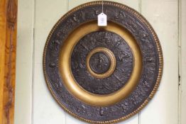 Renaissance style cast bronze charger with neo-classical decoration, 46cm diameter.