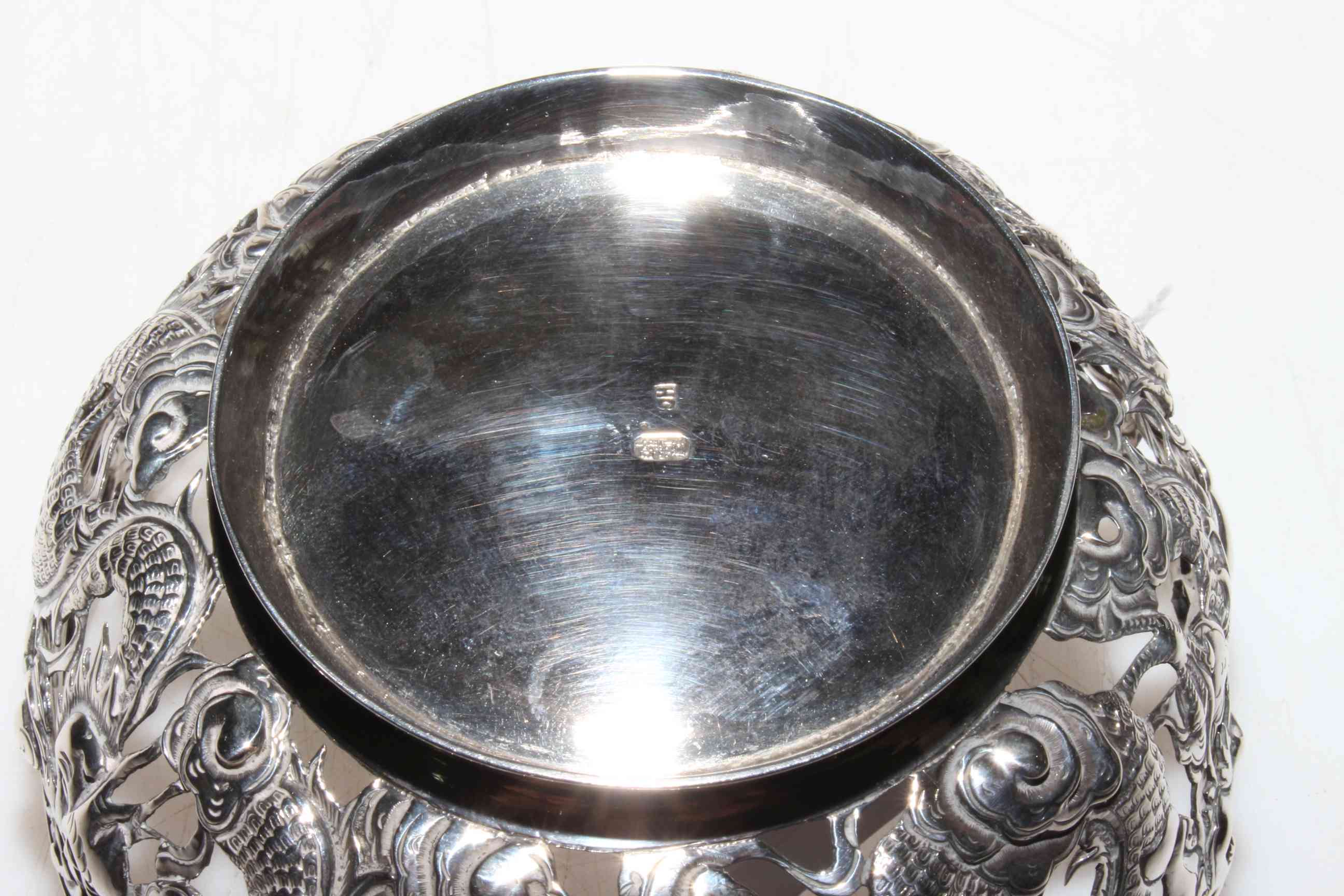 Chinese silver pierced bowl with continuous dragon decoration, 11cm diameter, 5. - Image 2 of 2