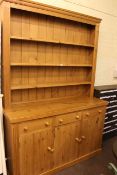 Waxed pine shelf back dresser, 219cm by 151cm by 54cm.