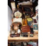 Oak mantel clock, two pairs of binoculars, bottle of Glenmorange, pair of copper vases,