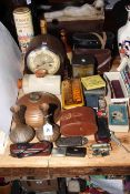 Oak mantel clock, two pairs of binoculars, bottle of Glenmorange, pair of copper vases,