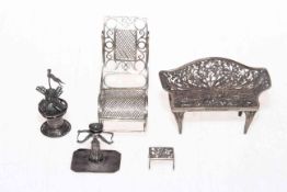Five pieces of Continental silver including rocking chair, bench and windmill, chair 7cm high.