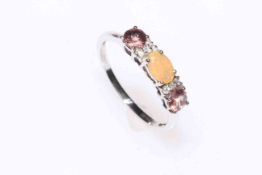 9k white gold colour change garnet and diamond ring, size N/O,