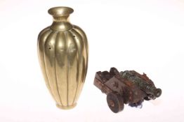 Fluted brass vase, 23cm, and small desk cannon (2).