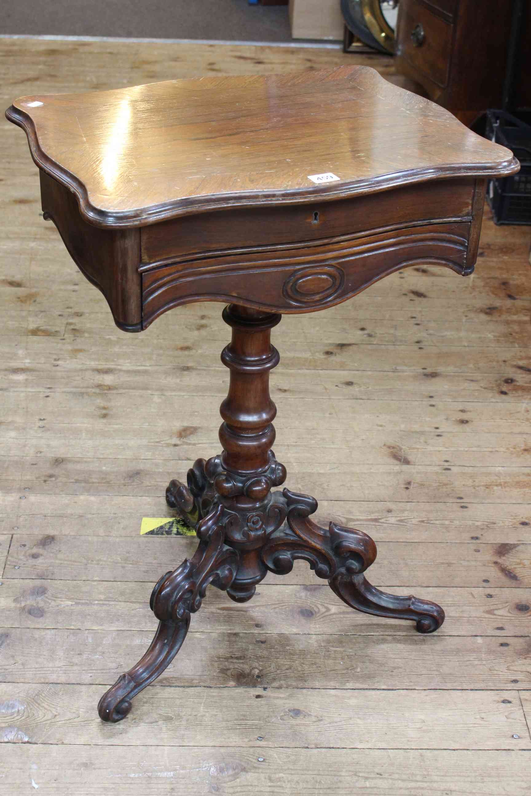Victorian sewing table of serpentine form,