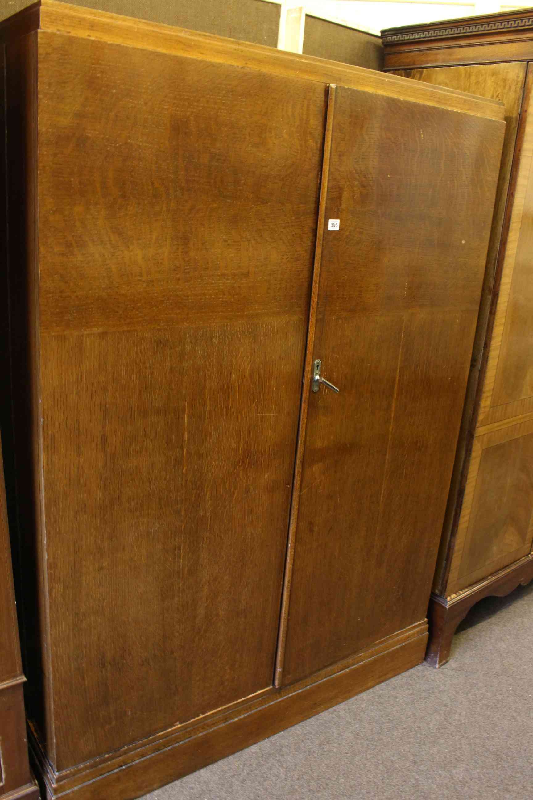 Early 20th Century oak compactum wardrobe bearing Regent St, London label,