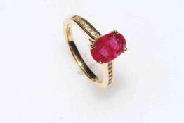 18 carat yellow gold, 2 carat ruby and diamond ring, size M.