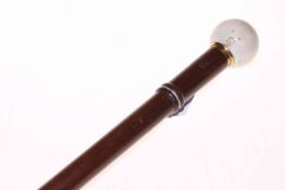 Ivory ball handled mahogany walking cane.