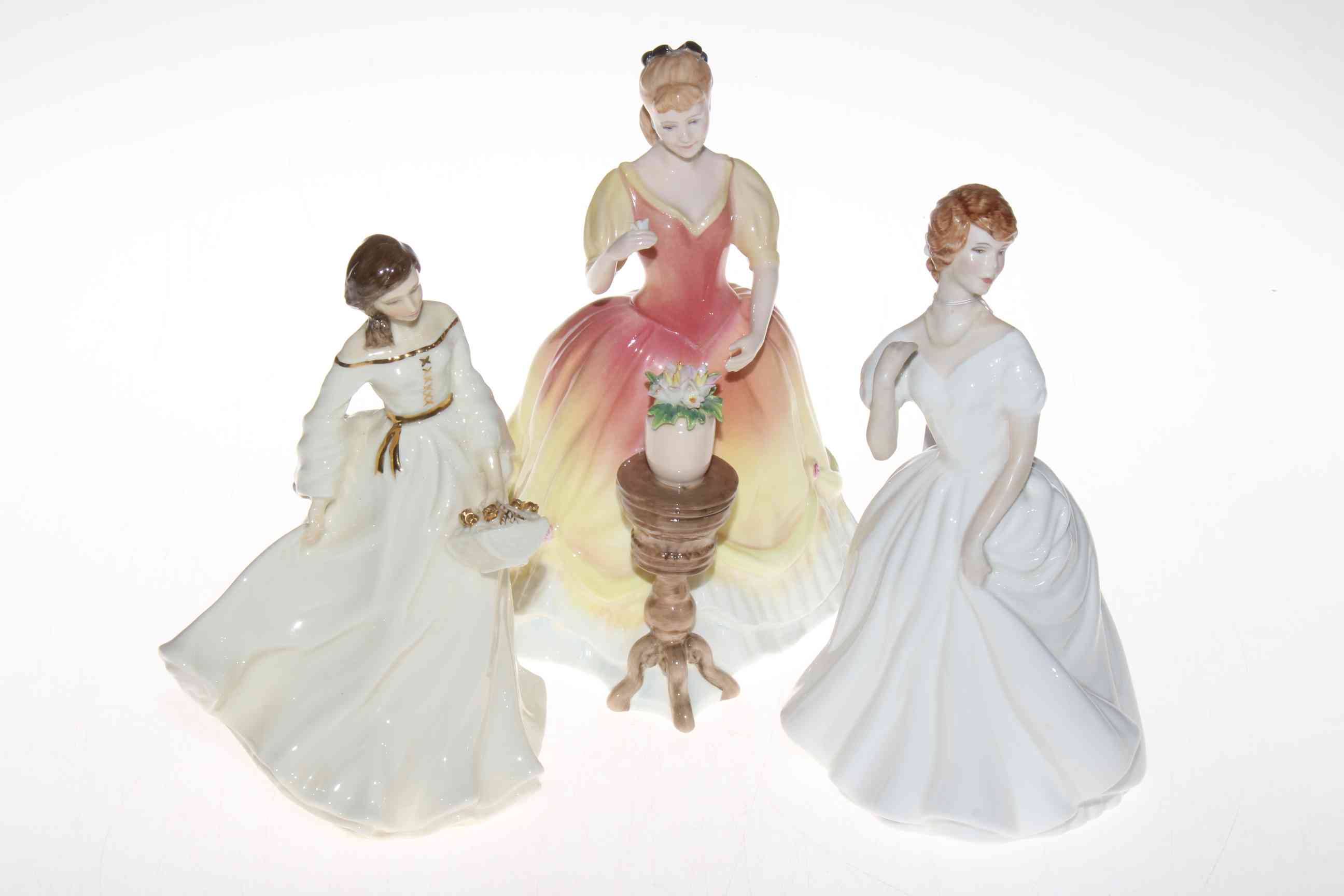 Three Royal Doulton figures '1993 Sarah', 'Patricia' and 'Spring Morning', all good condition.