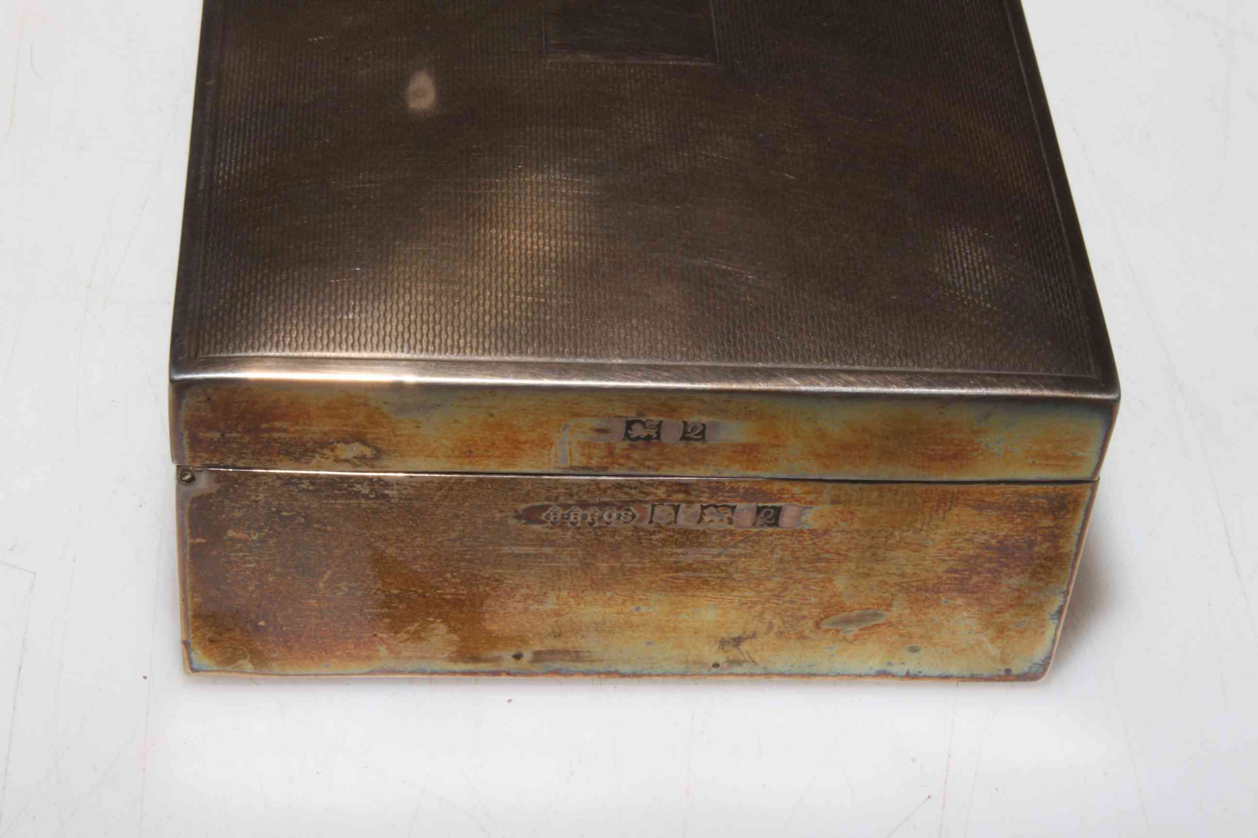 Silver cigarette box with engine turned lid, Birmingham 1965, 11.5cm across. - Image 2 of 2