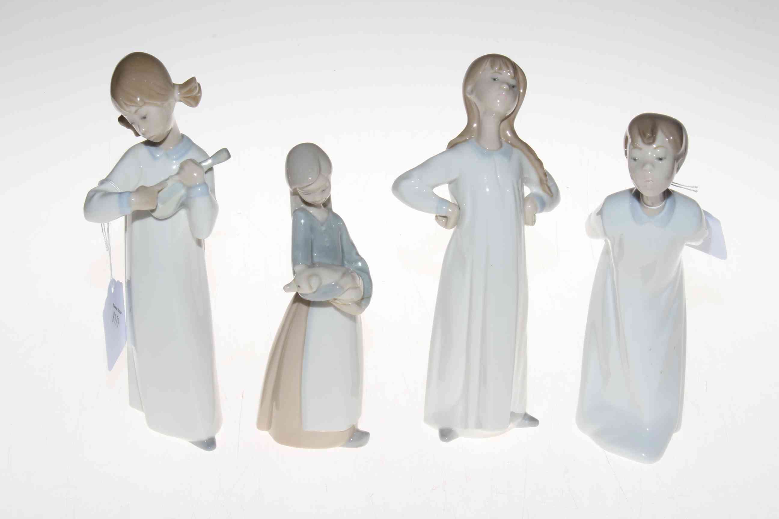 Four Lladro pieces, Boy Blowing, 4869, with box, Girl with mandolin,
