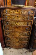 Burr walnut bow front chest of seven long graduated drawers, 113cm high by 68cm wide by 47cm deep.