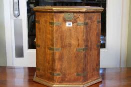 Campaign style hardwood and brass bound octagonal box, 45cm high by 43cm diameter.