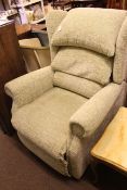 Sherborne electric reclining chair in light green fabric.