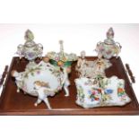 Five pieces of Continental floral encrusted china including pair of lidded vases,