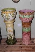 Two late Edwardian moulded jardinieres and stands, tallest 94cm.