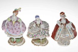 Pair of Sitzendorf porcelain crinoline ladies together with a third similar figure, tallest 23cm,