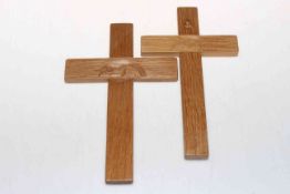 Two small oak crosses with Mouseman carving, largest 20.5cm by 13cm.
