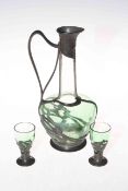 Art Nouveau pewter mounted glass ewer, 21cm high, and two glasses (3).