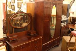 Edwardian inlaid mahogany three piece mirror door bedroom suite.