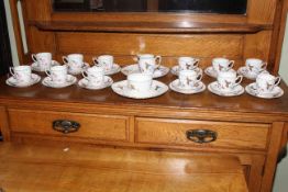 Royal Chelsea china tea set, twelve place setting, thirty nine pieces.