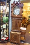 Antique mahogany eight day longcase clock having arched painted dial, 230cm.