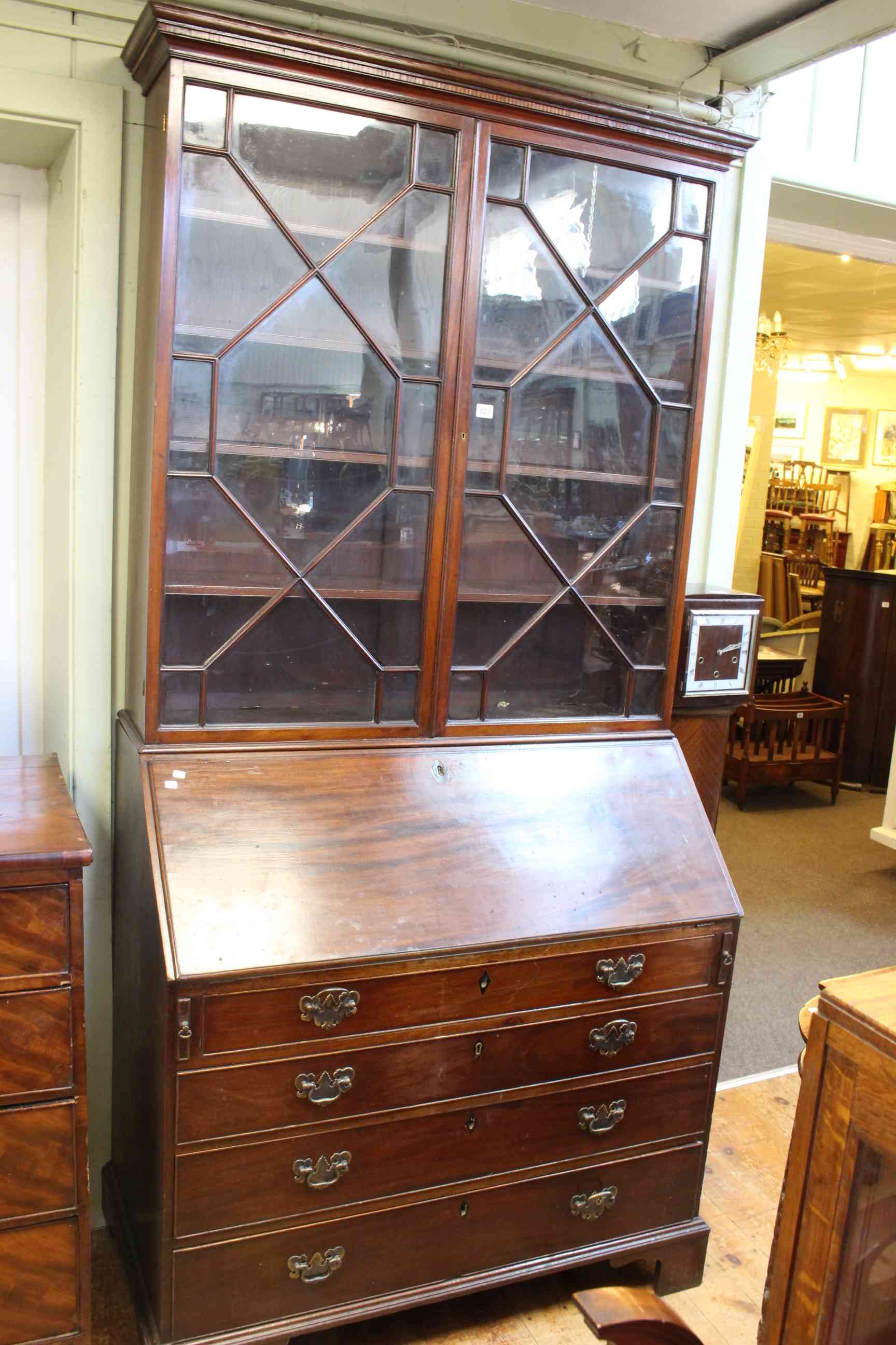 Georgian mahogany bureau bookcase having two astragal glazed doors above a fall front with four