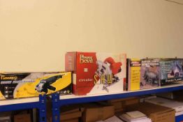 Four boxed power tools, angle grinder, circular saw, planer and bench grinder.