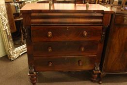 Victorian mahogany chest of four drawers on turned legs.