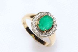 18 carat yellow gold, emerald and diamond ring having 1.