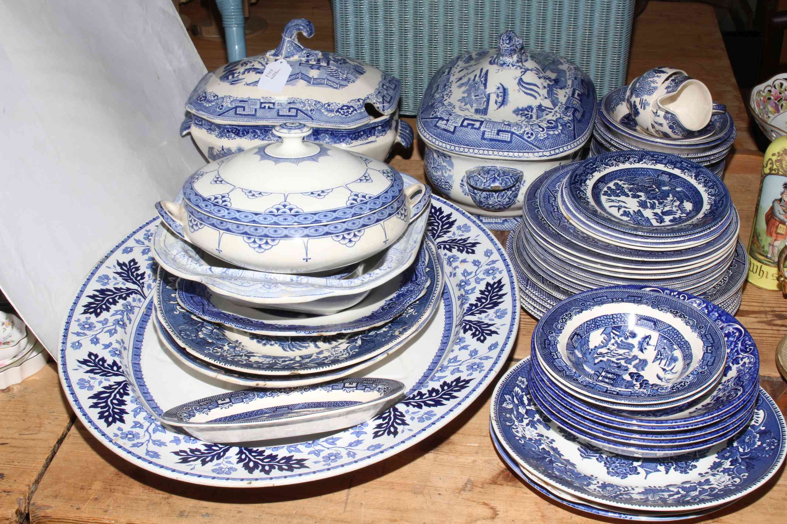 Blue and white china including tureens, meat plates, dinner plates some by Willow John Bros.