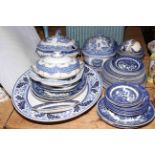 Blue and white china including tureens, meat plates, dinner plates some by Willow John Bros.