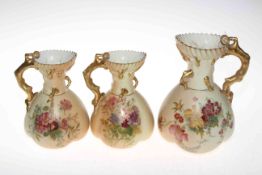 Three Royal Worcester blush ware coral handled jugs, all shape no.