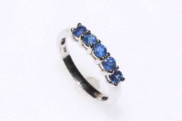 Sapphire five stone and 9 carat white gold ring, total sapphire 0.